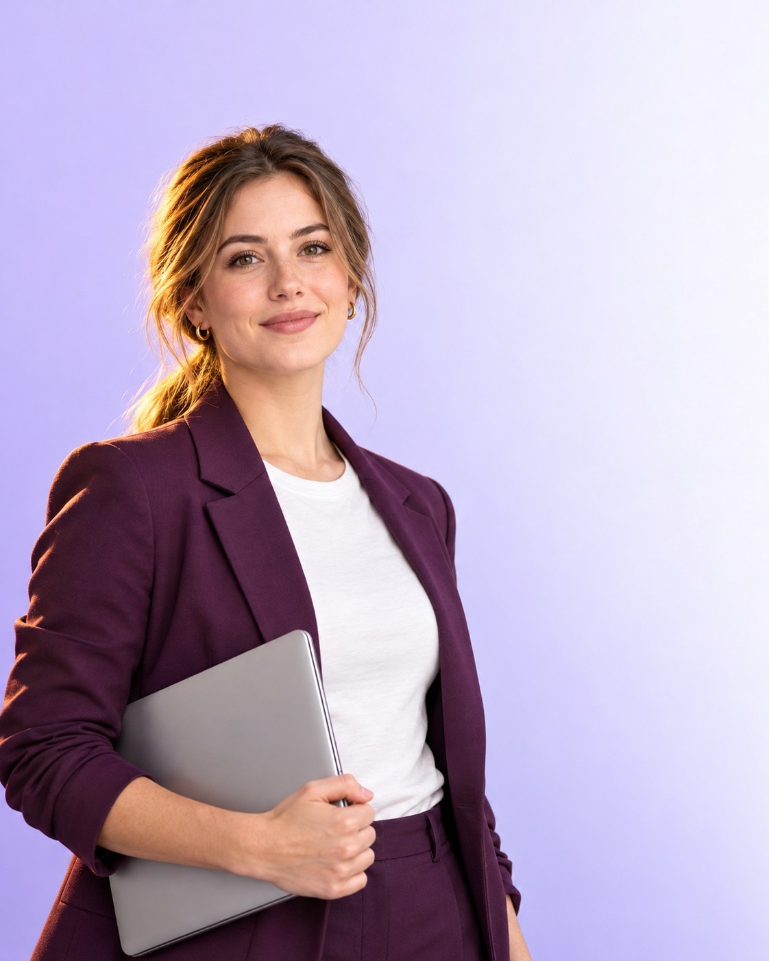 Job seeker holding her laptop, ready for her next role